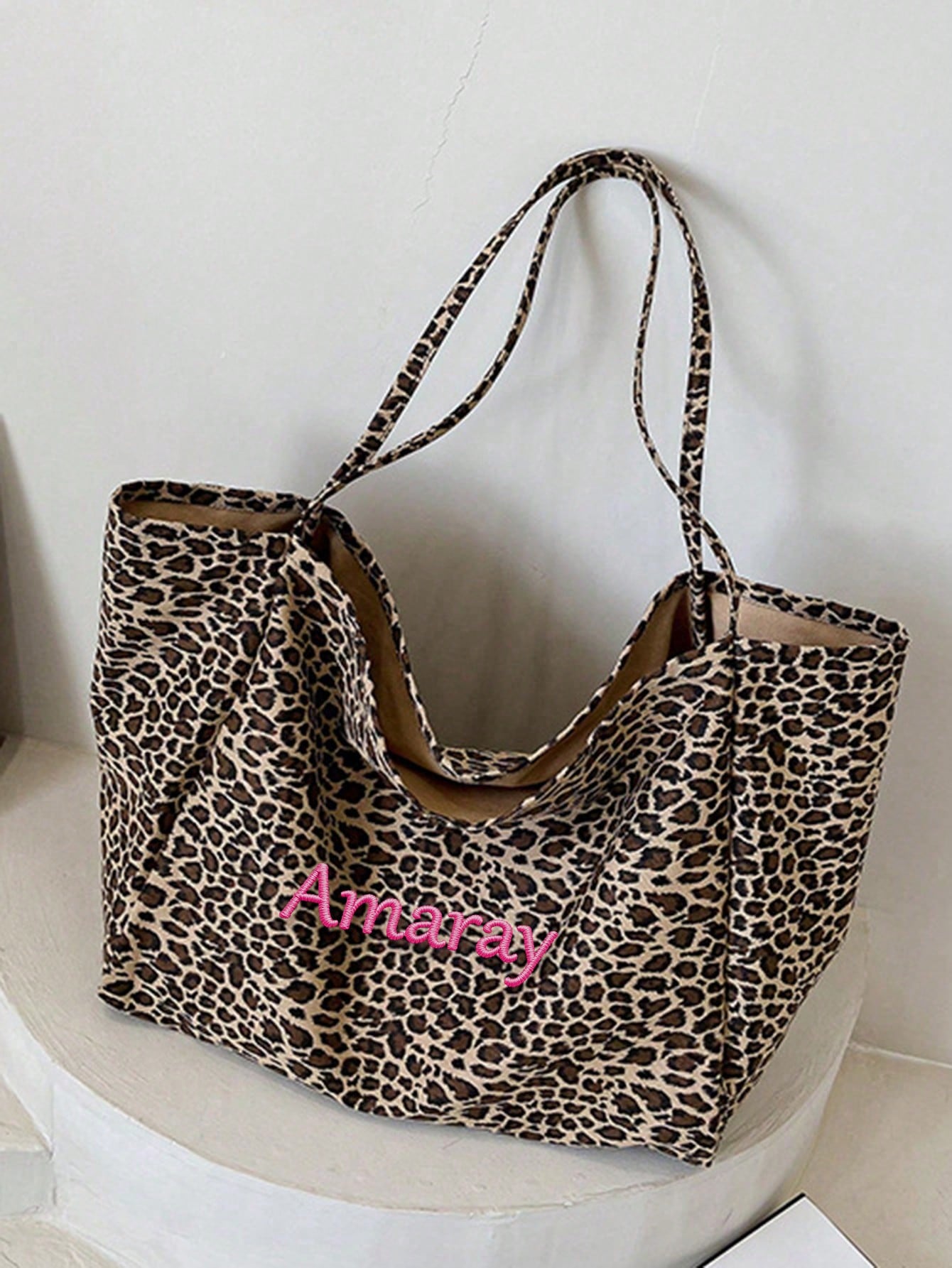 Bolso de mano con estampado de - Embroidery Names reseña y precio
